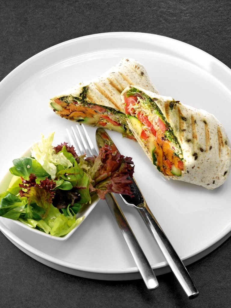 Burrito with grilled vegetables and pesto