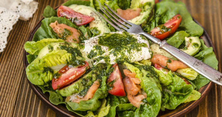 Roman salad with avocado, salted salmon and egg