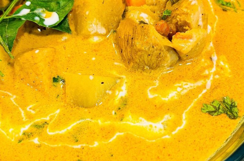 Chicken curry with potato and carrot in coconut milk